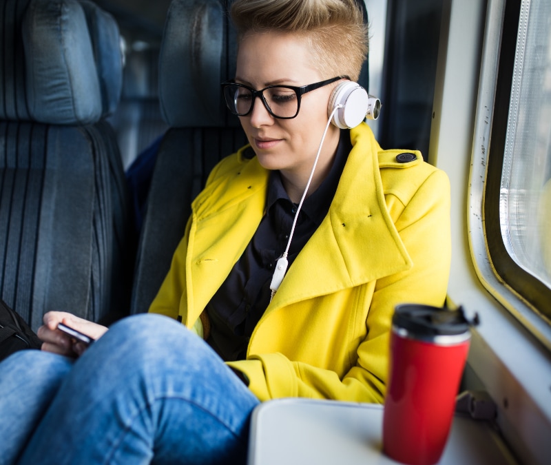 A person is connecting to the airplane wifi safely with a VPN.