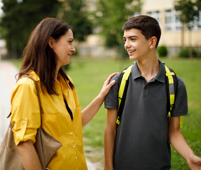 Mom and college freshman avoiding back-to-school scams.