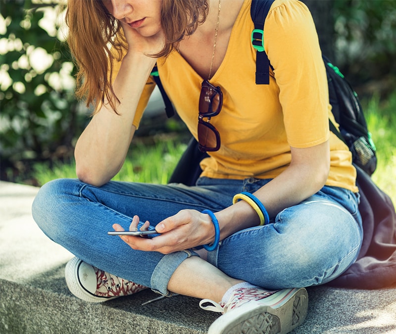 Teen facing cyberbullying.