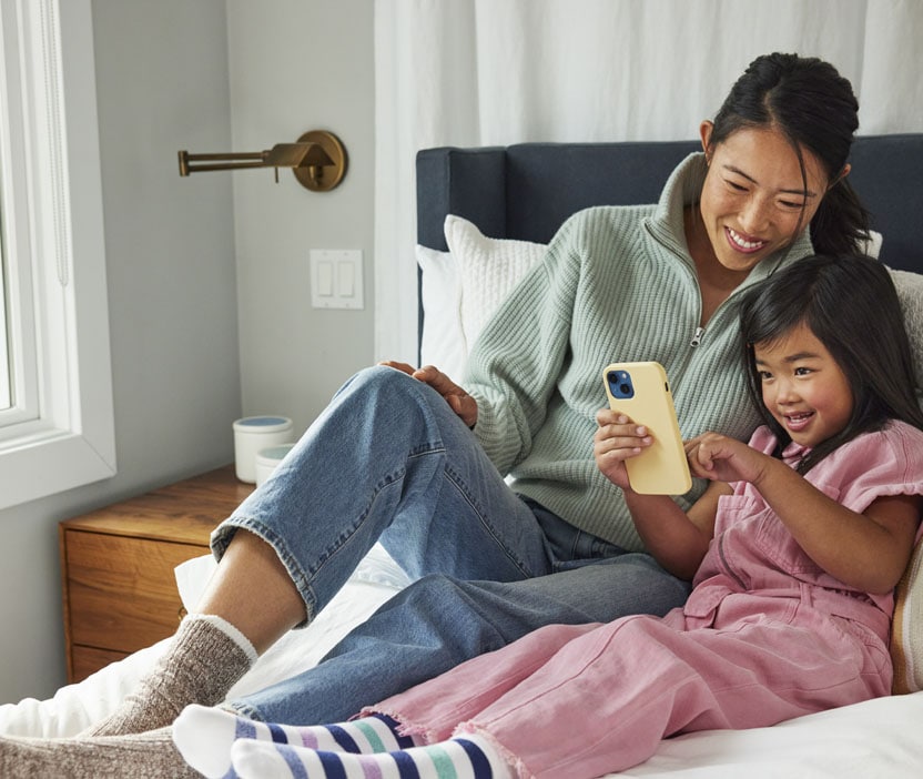 A mother and daughter researching a Tor vs a VPN.