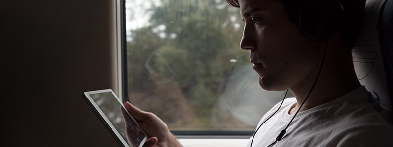 A woman on her mobile device about to do a dark web scan.