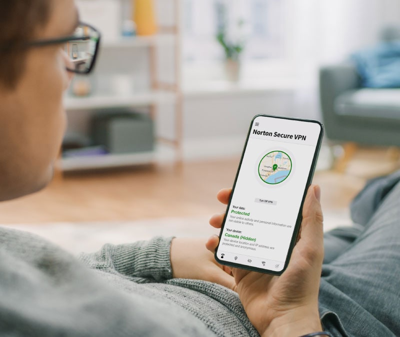 A man checks the Norton Secure VPN app to make sure his device is still protected.