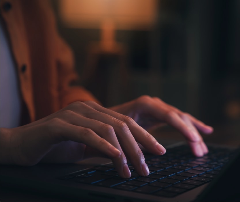 Photograph of someone using a computer to learn about typosquatting.