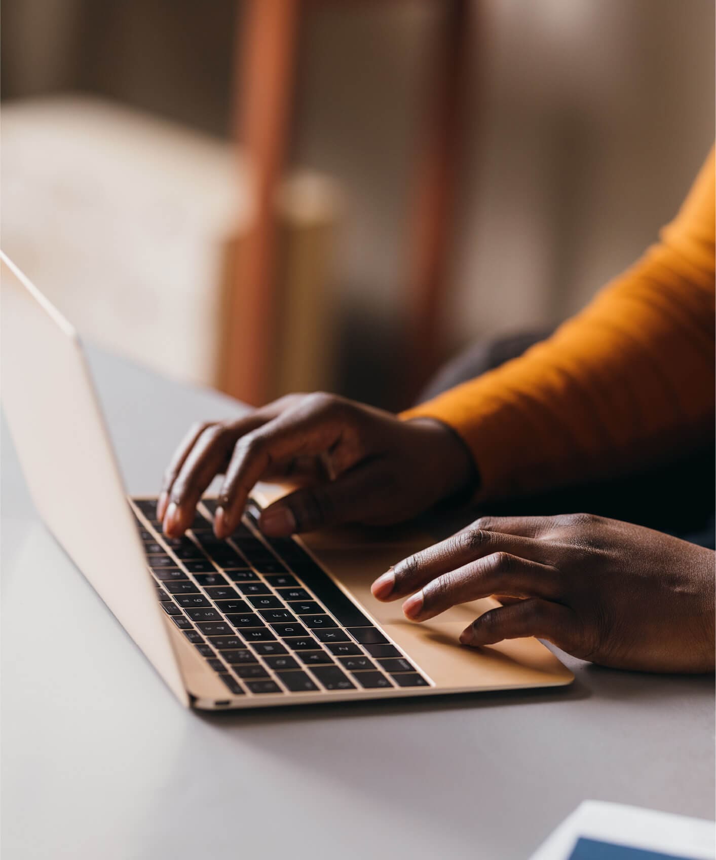 Person on a laptop researching cybercriminals. 