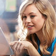 A person looking confused while holding a laptop with a cookie notification on the screen, captioned "Should you accept cookies?"