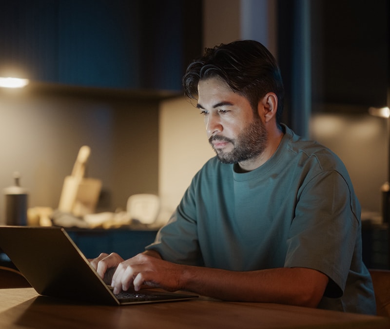 A person learns how to access the dark web on their computer.