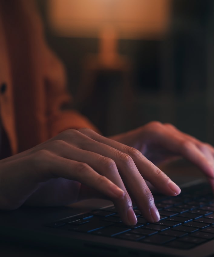 Photograph of someone using a computer to learn about typosquatting.